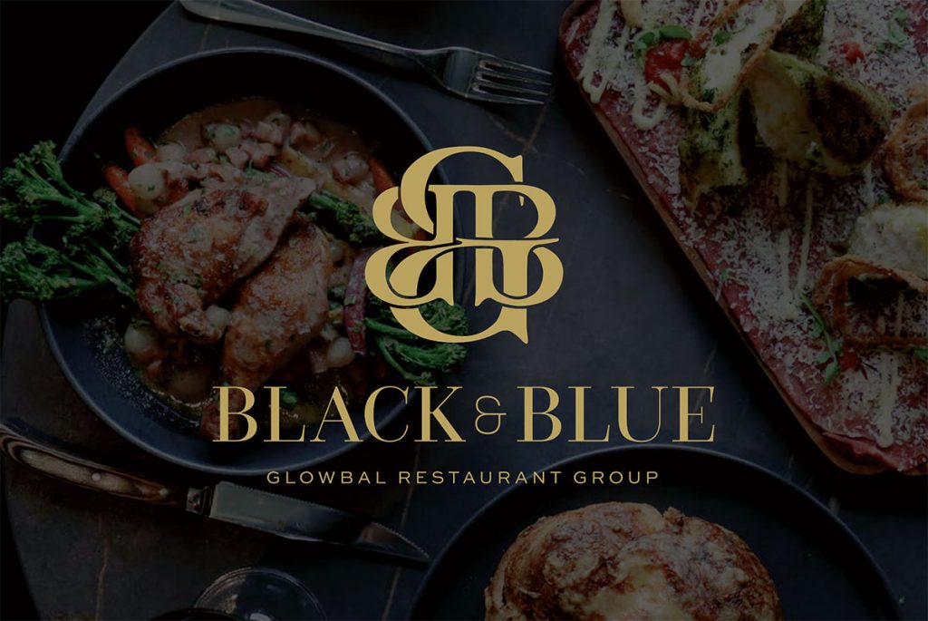 Black & Blue Steak House website design shown on laptop